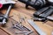 Collection of woodworking tools on a wooden background