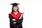 College degree. Happy young women in mortarboard holding diploma and smiling at camera while on white background