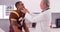 College football athete having medical physician check neck injury