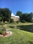 College lake bench green grass bulding