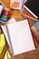 College student desk with blank writing book, white copy space