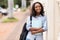 College student holding book