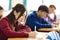 College student sitting and exam in the classroom