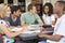 College students studying together in a library