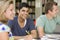 College students studying together in a library