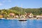 COLLIOURE, FRANCE - JULY 5, 2016: Yacht, beach and hotels in Collioure, Roussillon, Vermilion coast, Pyrenees Orientales, France