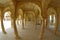 Collumned yellow hall in Sattais Katcheri in Amber Fort near Jaipur, Rajasthan, India. Amber Fort is the main tourist