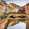 Colmar, Petit Venice, bridge, water canal, traditional houses. A