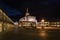 Colmenar de Oreja city landscape with the arcaded square illuminated at night, Spain