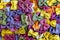 Colofrull Farfalle Italian pasta pattern. Various colors of bow tie farfalle pasta viewed from above. Top view