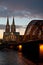 Cologne Bridge and Dom Cathedral at sunset