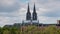Cologne Cathedral and Deutz bridge in cloudy sky