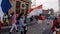 COLOGNE/GERMANY - March 2018: Flag of Cologne and France with traditional french costumes at carnival or Karneval parade Cologne