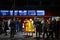 COLOGNE, GERMANY - NOVEMBER 11, 2022: Selective blur on 2 women dressed with bee costume for Cologne Carnival waiting in a crowd