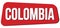 COLOMBIA text on red trapeze stamp sign