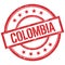 COLOMBIA text written on red vintage stamp