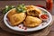 Colombian food fried empanadas with spicy sauce