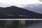 Colombian gachala toen viewed from guavio reservoir lake edge with andean mountains