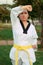 Colombian and Latin American woman practicing taekwondo defense in right fist position up