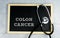 COLON CANCER wrote on chalkboard with stethoscope