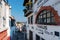 Colonial architecture, temple and paved roads, tiled roofs and white columns.