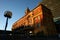 Colonial and classical outside facade of Ferry Terminal with roof tower in brick and stone at sunrise in Auckland CBD, New Zealand