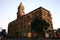 Colonial and classical outside facade of Ferry Terminal with roof tower in brick and stone at sunset in Auckland CBD, New Zealand