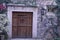 Colonial door with wall lantern in Guanajuato city