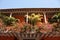 Colonial house. Balcony with flowers and plants