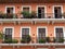 Colonial house balcony with flowers and plants