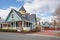 colonial revival home with an attached side garage and dormers