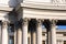 Colonnade with corinthian columns. Detailed view of the top part of column called small capital. Pillars of government.