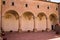 The colonnade of the inner courtyard of a medieval Italian abbey Gubbio, Umbria