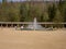 Colonnade of Luhacovice spa, fountain, people, forest and trees in the background