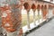 Colonnade in matttoni red and white marble columns