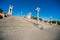 Colonnade, street lights, staircase