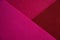 color abstract background for decoration. felt sheets of burgundy color. lines, geometry. viva magenta, the color of the year.