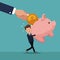 Color background of businessman carrying a piggy bank with hand depositing a coin inside