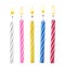 Color birthday cake candles on white