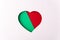 Color block paper heart,green and red background, minimalistic Valentine`s day symbol