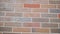 Color brick texture. Dark brown old bricks wall panorama