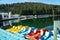 Color catamarans in lake in Carpathian mountains