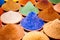 Color coloring dye powder piles in Indian market blue, orange, yellow