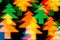 Color defocused bokeh of christmas fir-tree lights