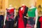 Color dresses and suits on mannequins in mall