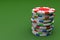 Color Gambling Chip Stack on Green Gaming Table