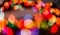 Color garland wreath bokeh background, unfocused.