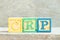 Color letter block in word CRP abbreviation of C-Reactive Protein Test on wood background