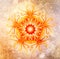 Color ornamental mandala and softly blurred watercolor background. Sacral Chakra.