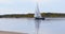 Color picture of a wooden boat on a river.